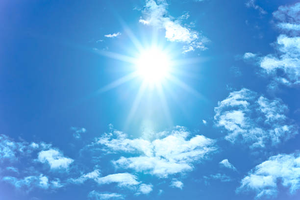 istock XXXL Sunshine background with some clouds 182870658