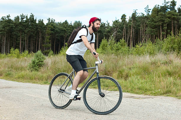 istock Young man on fixed wheel bike 182870840