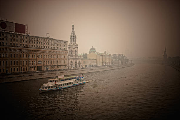 Moscow River and Kremlin Towers in smoke from forests fires