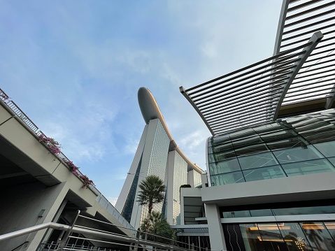 Marina Bay Sands, an iconic architectural marvel in Singapore, graces the skyline with its three towering structures connected by a spectacular rooftop infinity pool. This integrated resort, with its world-class amenities, luxurious accommodations, and breathtaking views of the city, stands as a symbol of modern opulence and innovation.