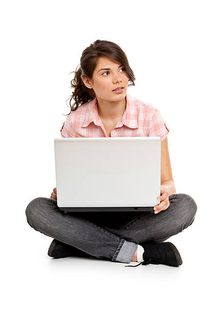 istock young attractive woman with laptop 182871475