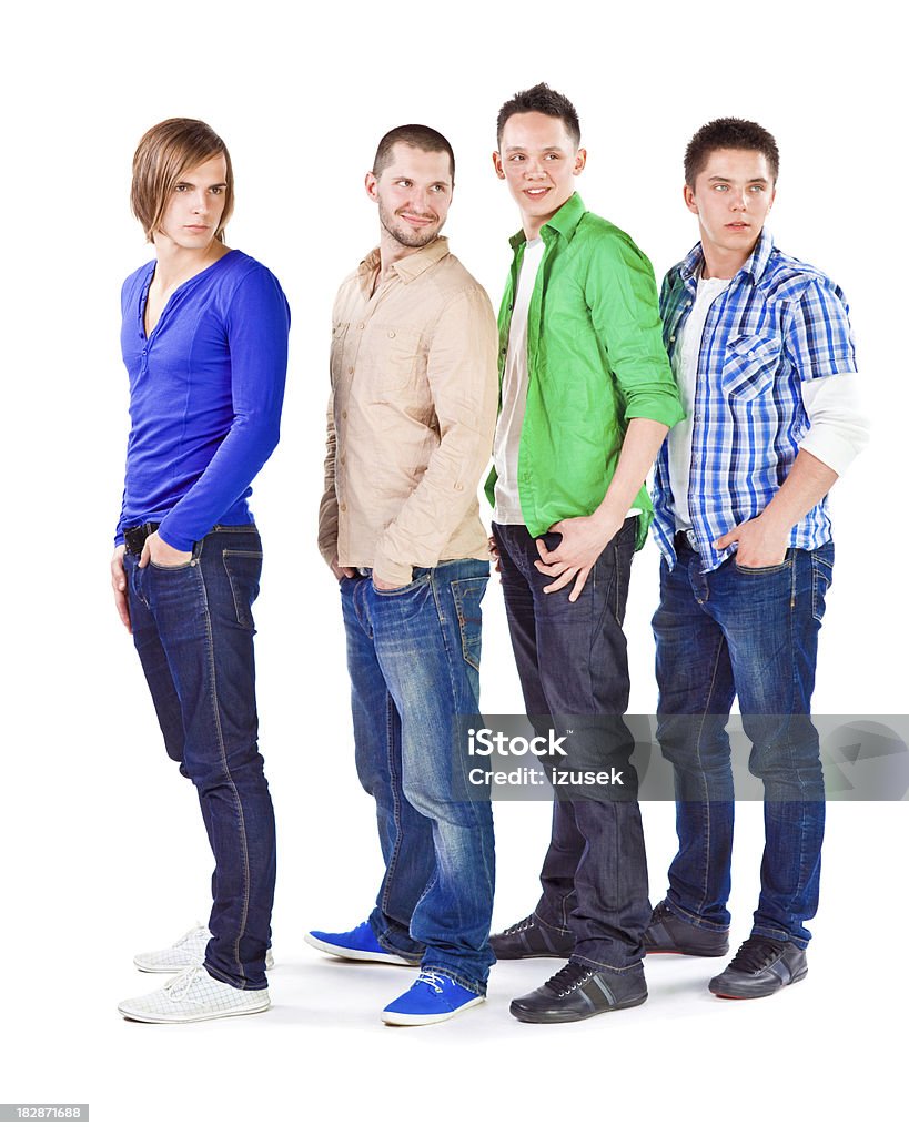 Young adult men Group of young adult men standing in a row and looking at something. Studio shot on the white background. Green Color Stock Photo