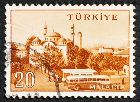 Turkish postage stamps on black background