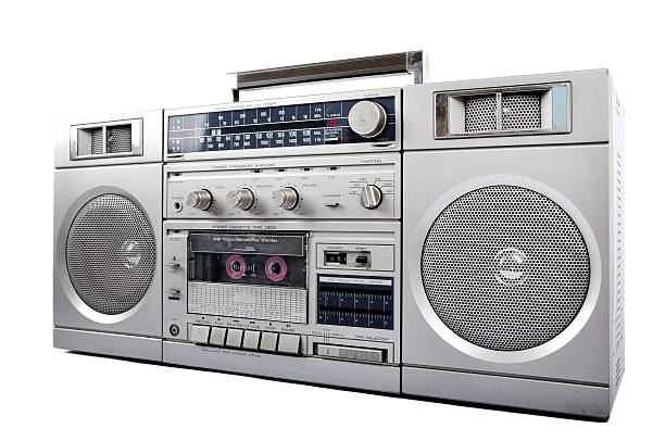 istock 1980s Silver retro, boom box and headphone isolated 182871814