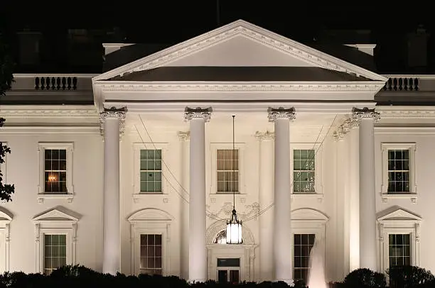 Closeup of the Whitehouse at night.