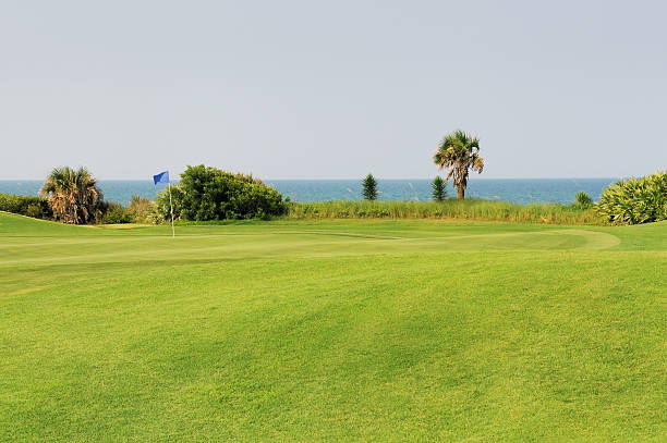istock Oceanfront Hole Green on Florida Golf Course Overlooking Atlantic Ocean 182872153