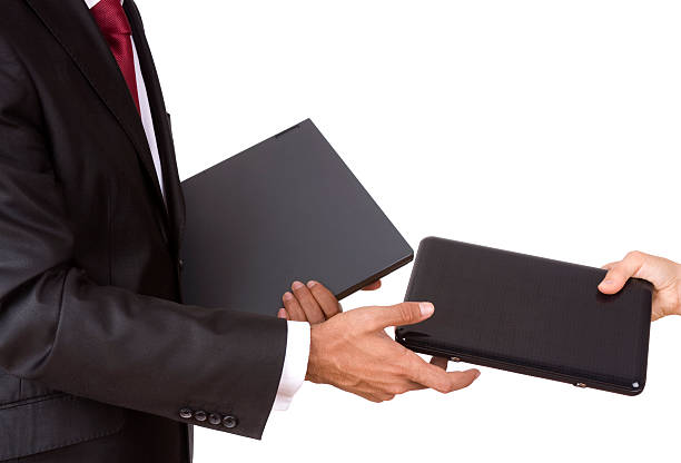 istock Businessman with laptop and netbook 182872463