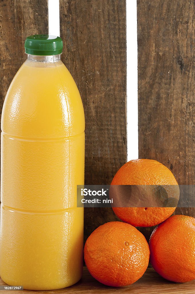Succo di frutta e arance. - Foto stock royalty-free di Agrume