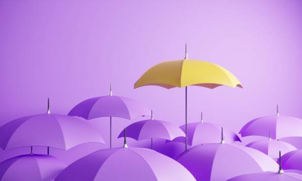 Different umbrella Yellow colored umbrella between the purple umbrellas. (3d render) individuality stock pictures, royalty-free photos & images