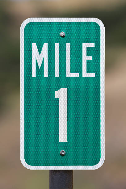 One Mile Marker Mile Number 1 of a set of mile markers 0 through 10Part of the Milepost Sign Series: distance sign stock pictures, royalty-free photos & images