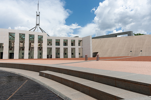 Canberra Australia - January 23 2011; one side of Parliament House entrance with curving lines of step levels leading to entranceway.