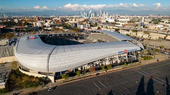 Los Angeles, CA - November 17, 2023: BMO stadium with with Los Angeles skyline in the background