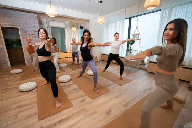 istock Group of women at yoga class 1828736328