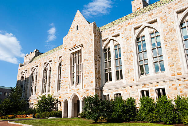 Building on campus of Boston College in Chestnut Hill, MA "A building on the campus of Boston College in Chestnut Hill, MA.Other images of Boston College:" boston college campus stock pictures, royalty-free photos & images