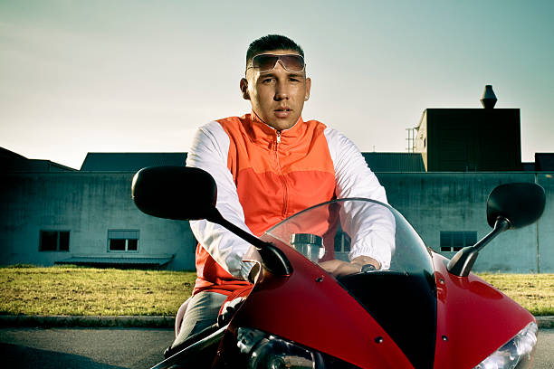 istock Young man sitting on the motorbike 182874188