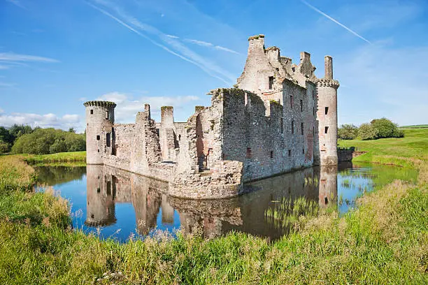 "The moated 13th Century Caerlaverock Castle on the Solway Firth just south of Dumfries, Scotland. Unique in Britain for its triangular plan."