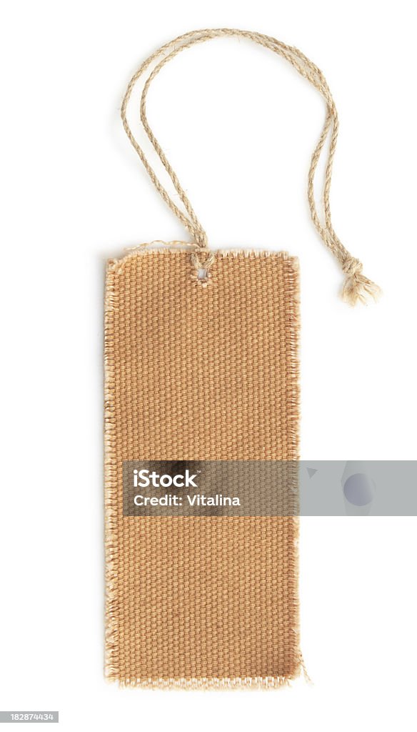Blank Tag. Blank tag tied with brown string.Isolated on white. Burlap Stock Photo