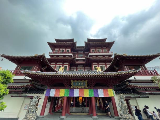 Singapore Travel Pictures Singapore's Chinatown stands as a vibrant cultural enclave, where the rich tapestry of Chinese heritage comes alive amid the bustling urban landscape. Lined with traditional shophouses adorned with intricate motifs, this neighborhood is a sensory feast of colorful lanterns, aromatic incense, and lively markets. Temples like the Buddha Tooth Relic Temple and Thian Hock Keng Temple add a spiritual touch, while the air is filled with the sizzle of street food stalls offering delectable treats. From traditional medicinal shops to modern boutiques, Chinatown seamlessly blends the old and the new, making it a must-visit destination for those seeking a taste of China's cultural essence in the heart of Singapore. gardens-by-the-bay-dome stock pictures, royalty-free photos & images