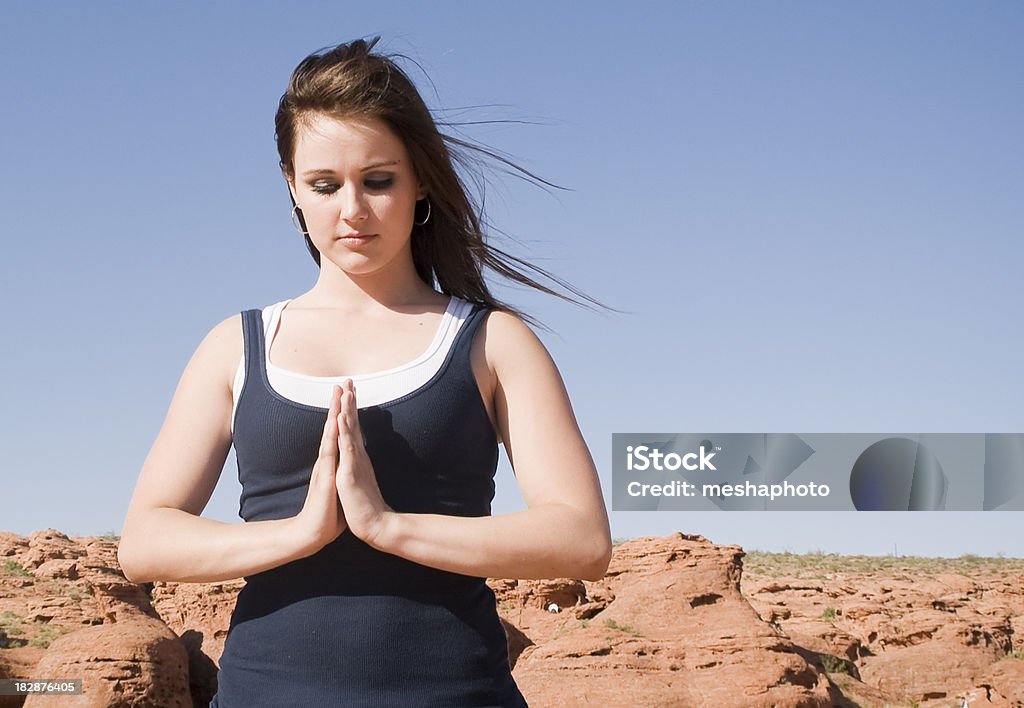 Woman Holding a Believe Sign Young woman holding a believe sign in the name of god. Religion/ch Adolescence Stock Photo