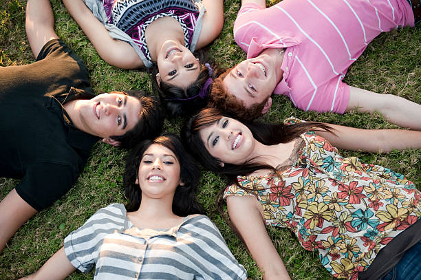 istock Playful friends laying down 182876451