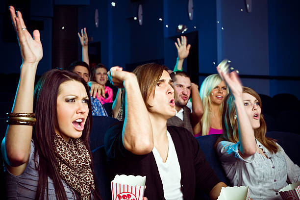 istock Young people in movie theater 182878379