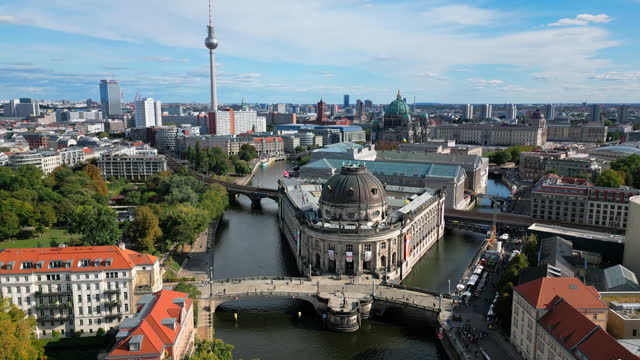 Aerial view Real time Footage of Berlin Bode museum with Monbijou Bridge over spree river and Berlin Cathedral and Television tower or TV tower at Alexanderplatz in Berlin, Germany