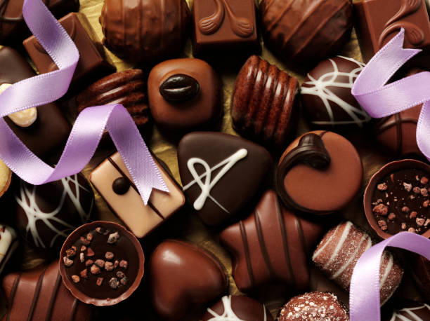 istock Chocolates and Purple Ribbon 182879463