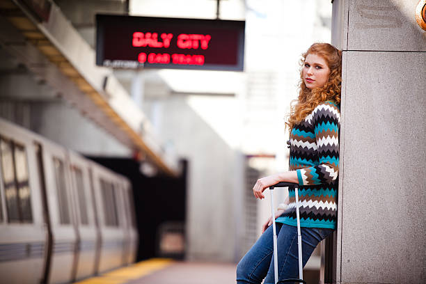 istock Girl leaning against wall at a BART station 182879763