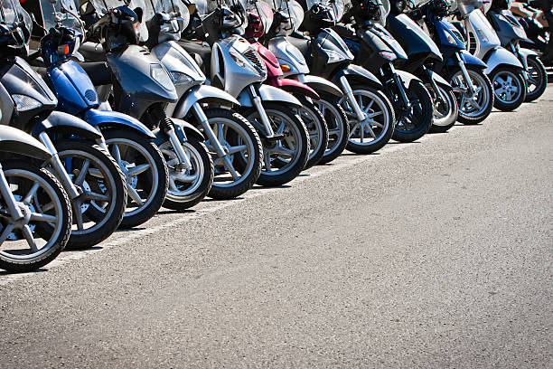 Row of polluting scooters parked in Firenze (Tuscany, Italy)