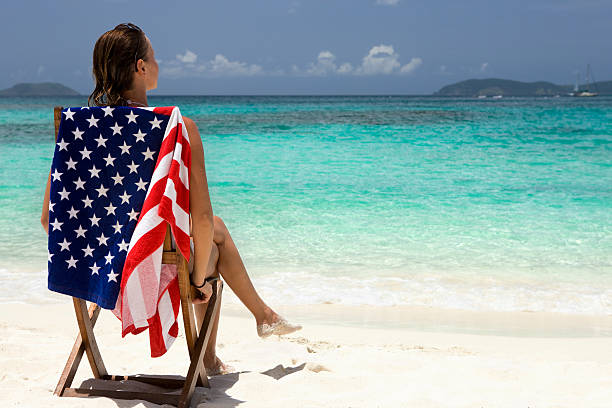 женщина в отпуске на пляже в американские виргинские острова - swimwear caribbean sea beach water стоковые фото и изображения