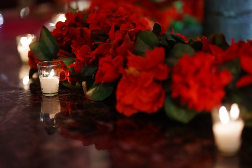 Red flowers and candles in wedding india