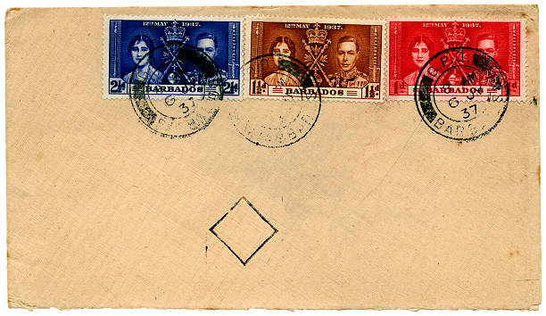 1937 Coronation stamps on envelope from Barbados to England An envelope posted from Barbados to England with stamps celebrating the Coronation of George VI and Queen Elizabeth (later the Queen Mother) in 1937.More West Indies mail from my portfolio: george vi stock pictures, royalty-free photos & images