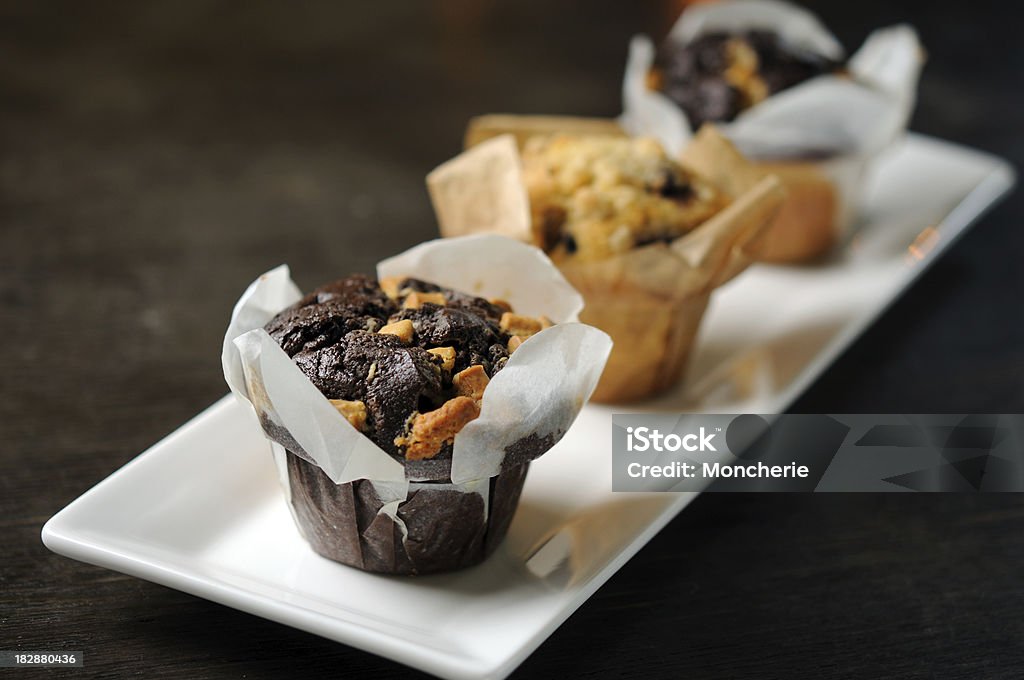 Chocolate - Blueberry Muffins Chocolate - Blueberry Muffins - selective focus Cake Stock Photo