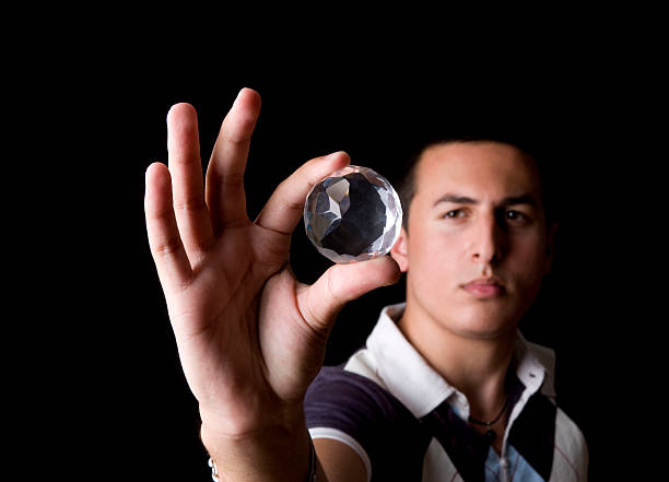 istock Young adult looking at diamand 182880629