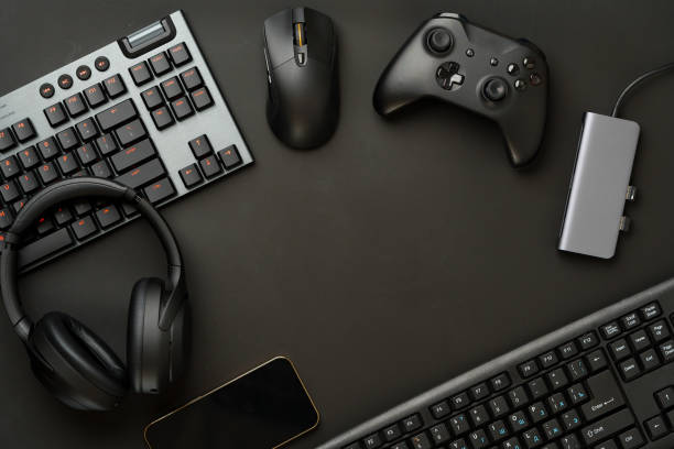 istock Gaming concept on black background with computer keyboard and joystick 1828806488