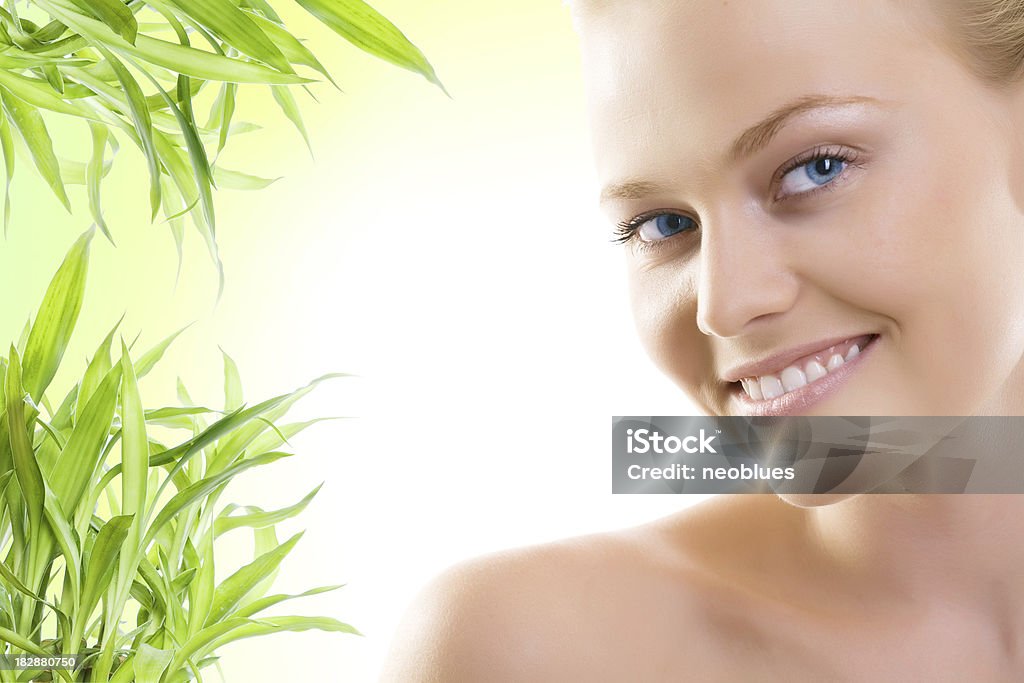 Half face of woman Beautiful young woman with a bamboo plant Adult Stock Photo