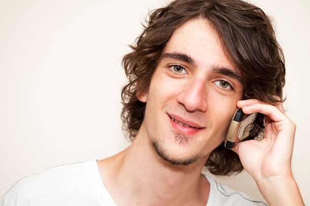 istock Young Man on Mobil Phone 182880843