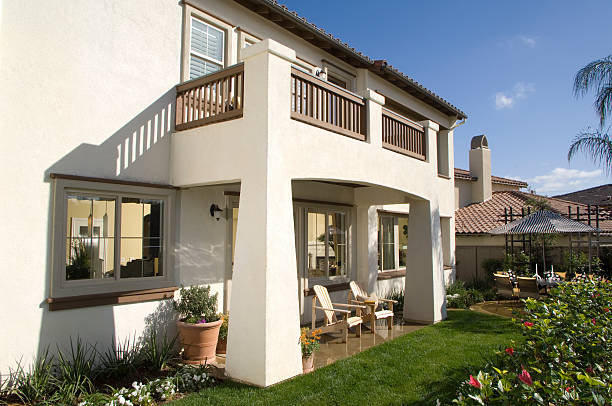 istock Home Exterior House Design backyard Landscaping 182880976