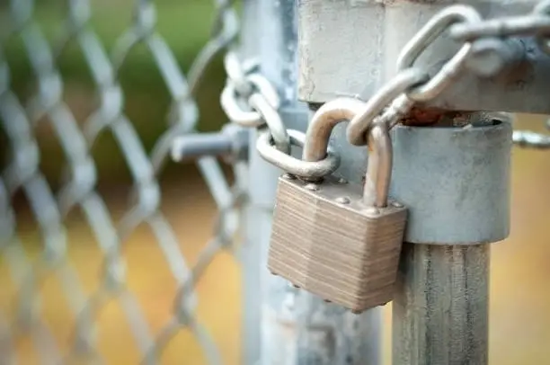 Photo of Chain link fence gate locked door