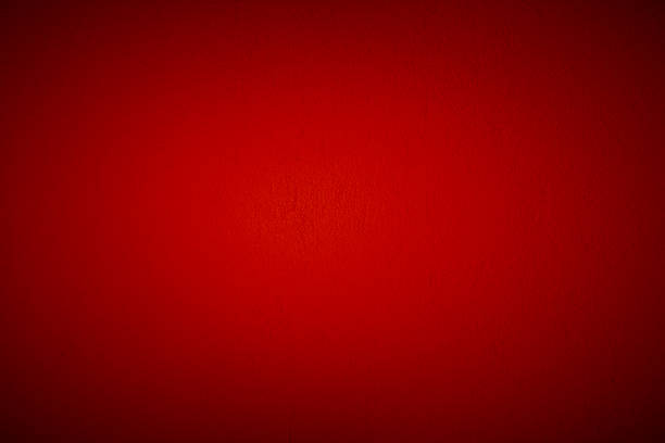 Red Backgound Image of a red wall. vignette stock pictures, royalty-free photos & images