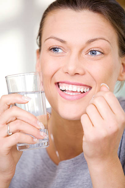 istock woman with water 182881412