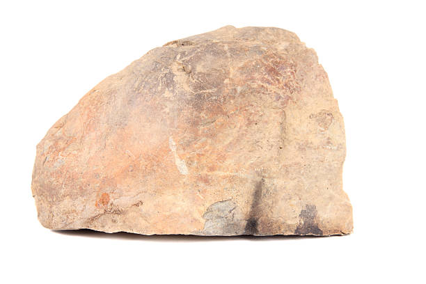 Big piece of coarse rock with scratches and patterns A big rock on a white background boulder rock photos stock pictures, royalty-free photos & images