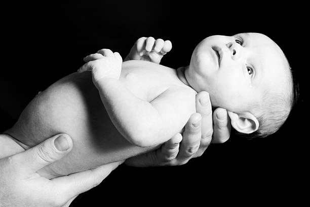istock Newborn Baby Black and White 182882193