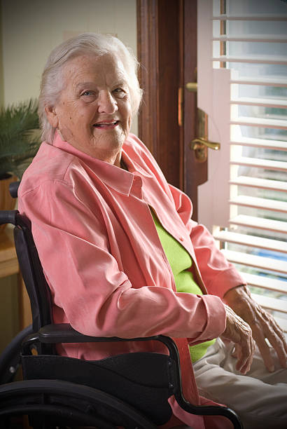 istock Senior citizen in a wheelchair 182882657