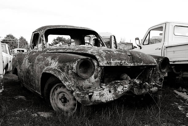 istock Old car in junkyard 182882662