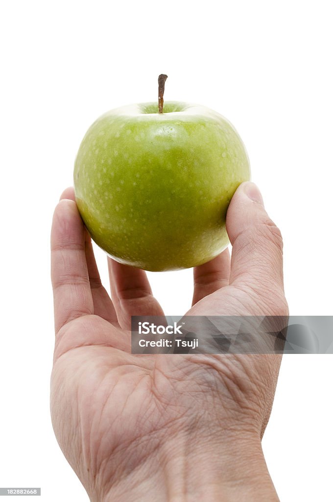 Hält grünen Apfel - Lizenzfrei Apfel Stock-Foto