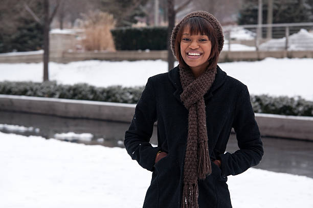 Chicago Winter Woman Woman in a Chicago park millennium park stock pictures, royalty-free photos & images