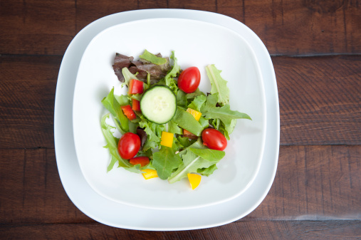 a bit of salad / a portion fit for diets / a trendy square plate