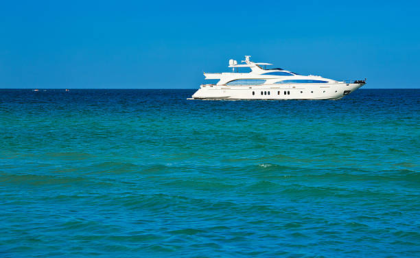 istock luxury boat in miami beach 182884079