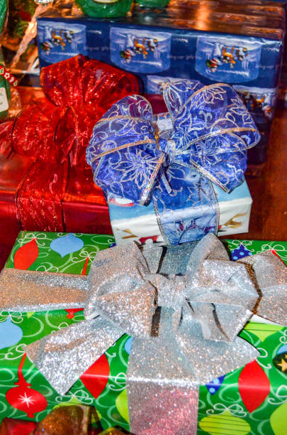 istock Wrapped Christmas Presents under a Family Christmas Tree 1828845742